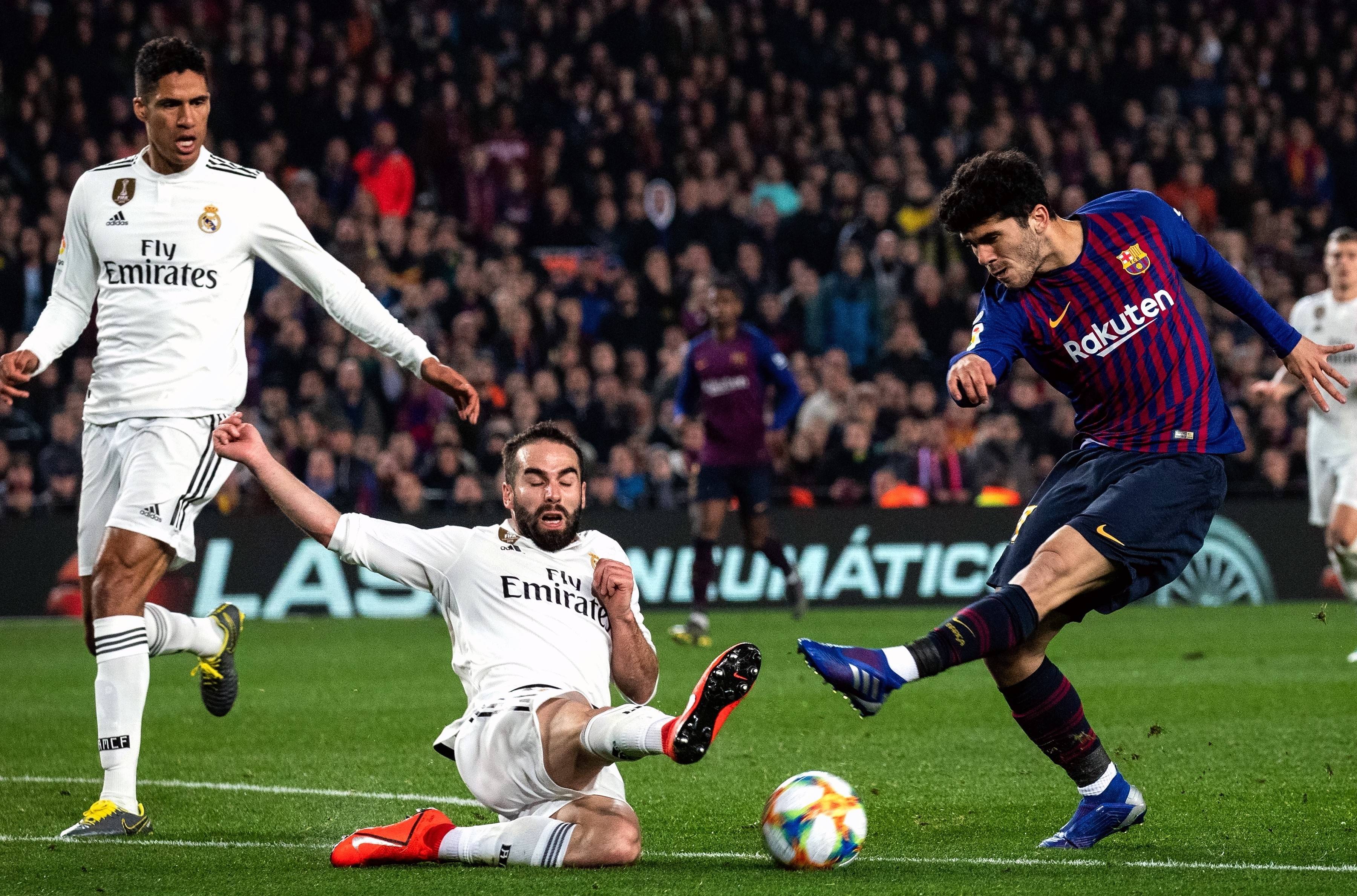 爱游戏网站入口-马德里德比平局,皇马抢闲看热闹