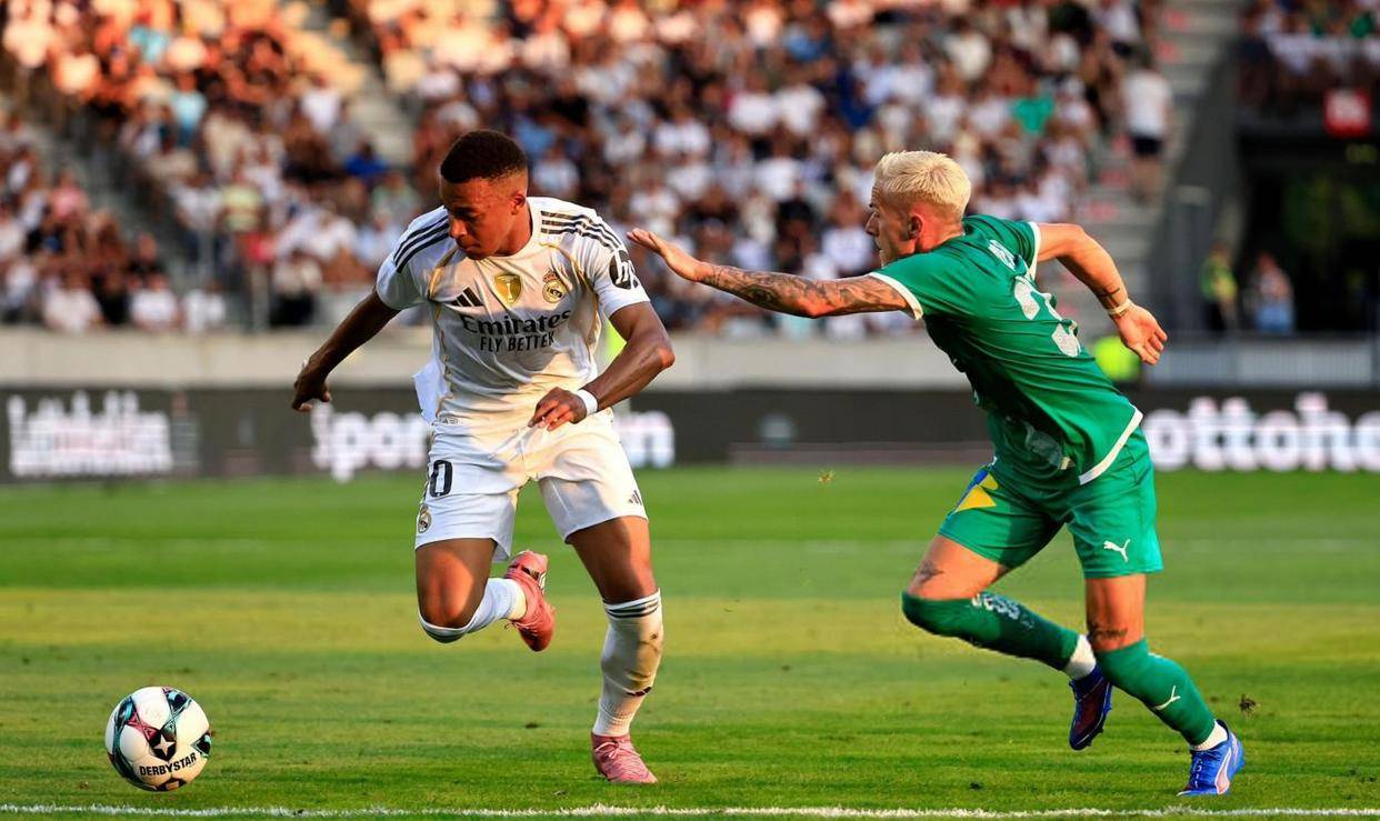 包含皇马关键时刻破门，客场获胜逼近积分榜前列的词条